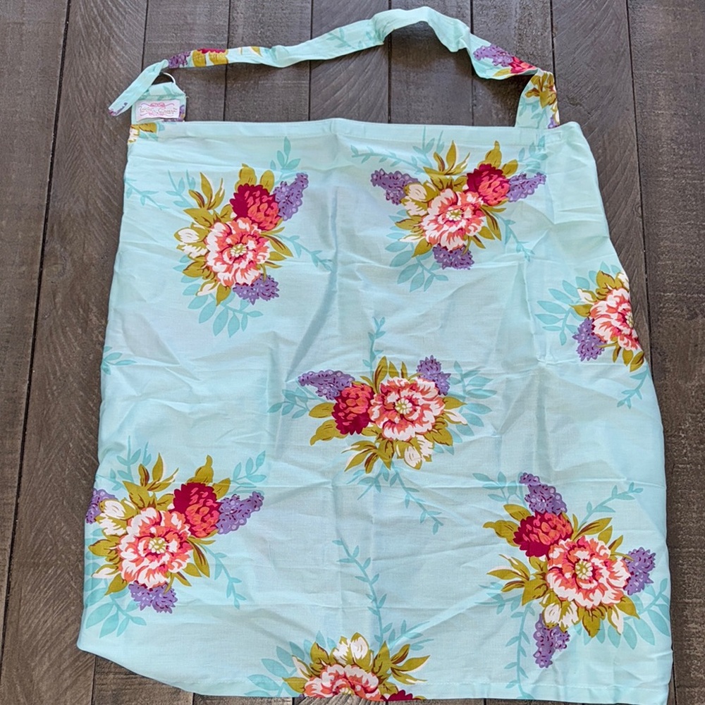 Green and Blue Floral Cover with Vibrant Roses